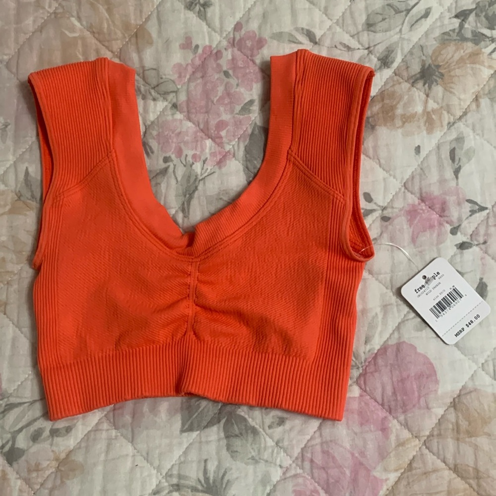 Free People Sports bra- size xsmall. Brand new with tag. Orange!